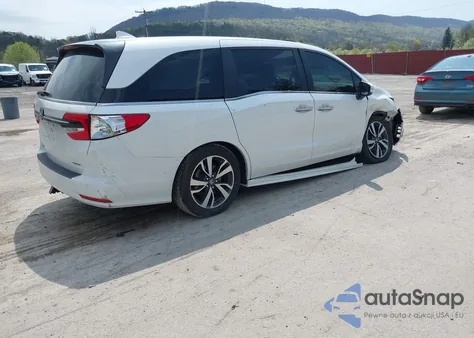 2021 Honda Odyssey Touring z USA, uszkodzony, nr VIN 5FNRL6H80MB010952